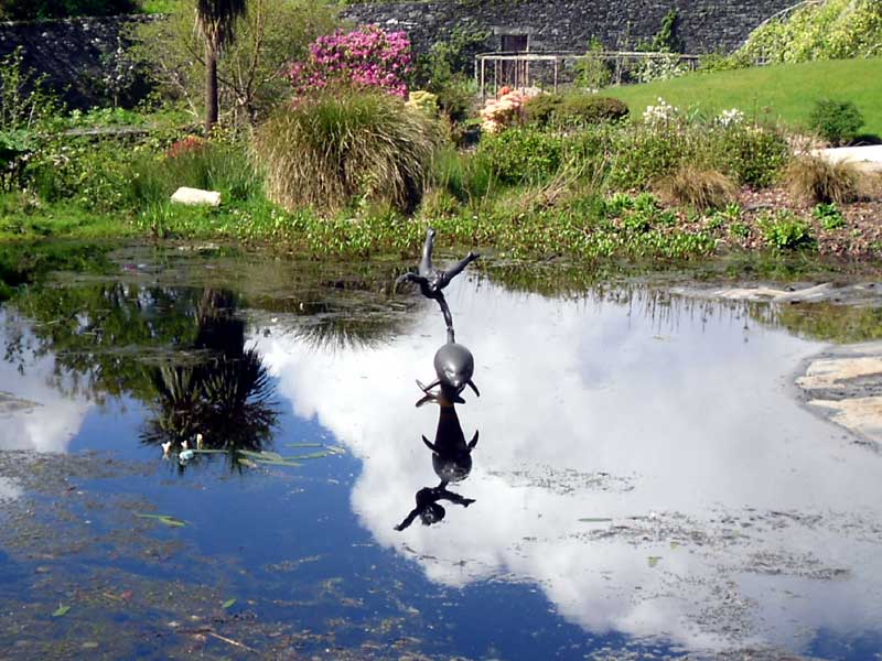 Sculpture of boy and dolphin by David Wynne